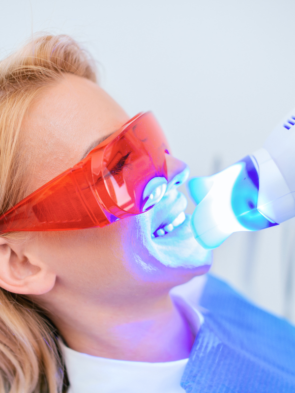 Teeth Whitening - Smiling Patient During Teeth Whitening Procedure - Plaza Dental Specialty Group